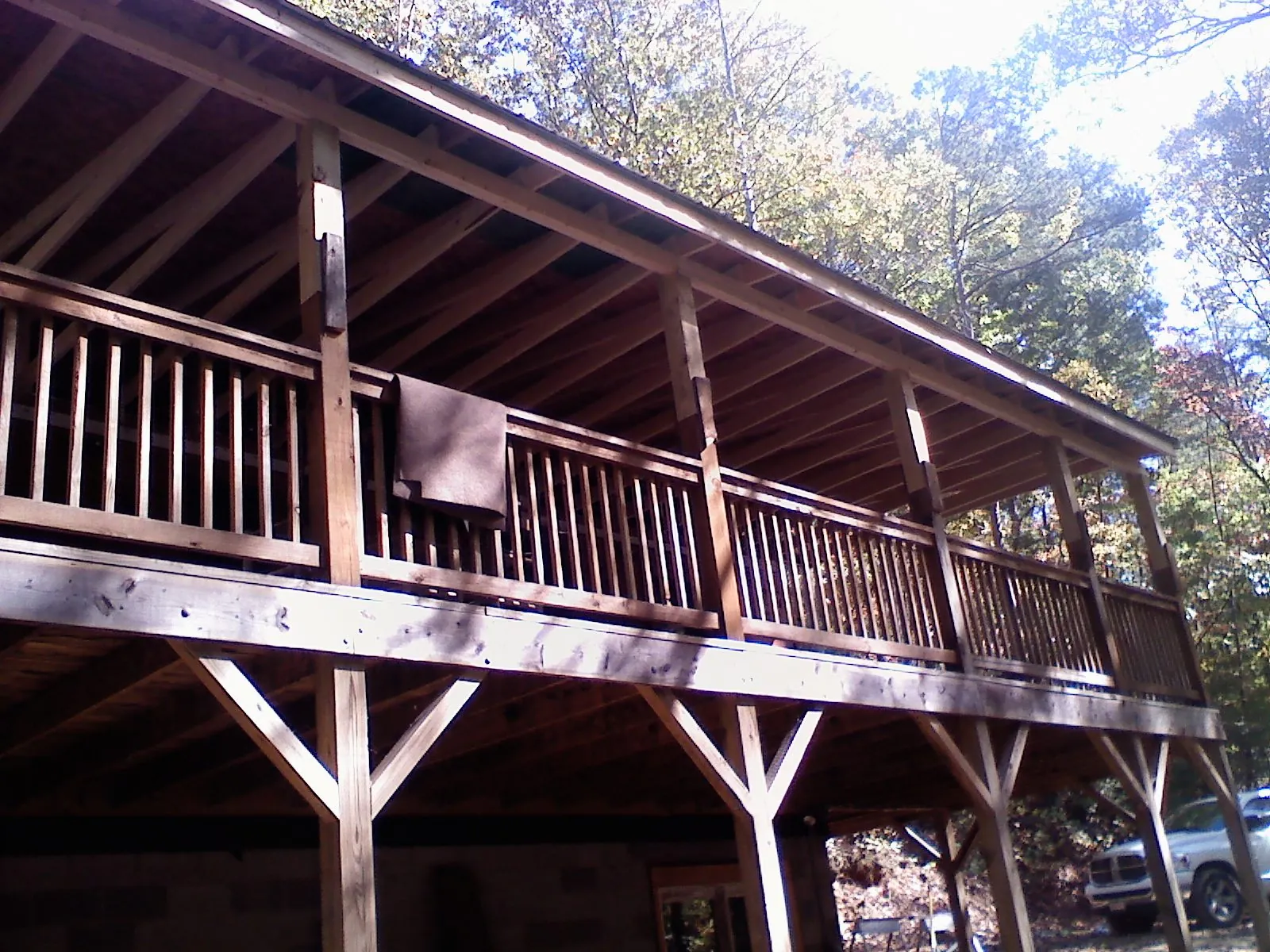 Timber framing under a new elevated porch and deck — Roof Leak Repair in Severance by Roofing Brothers